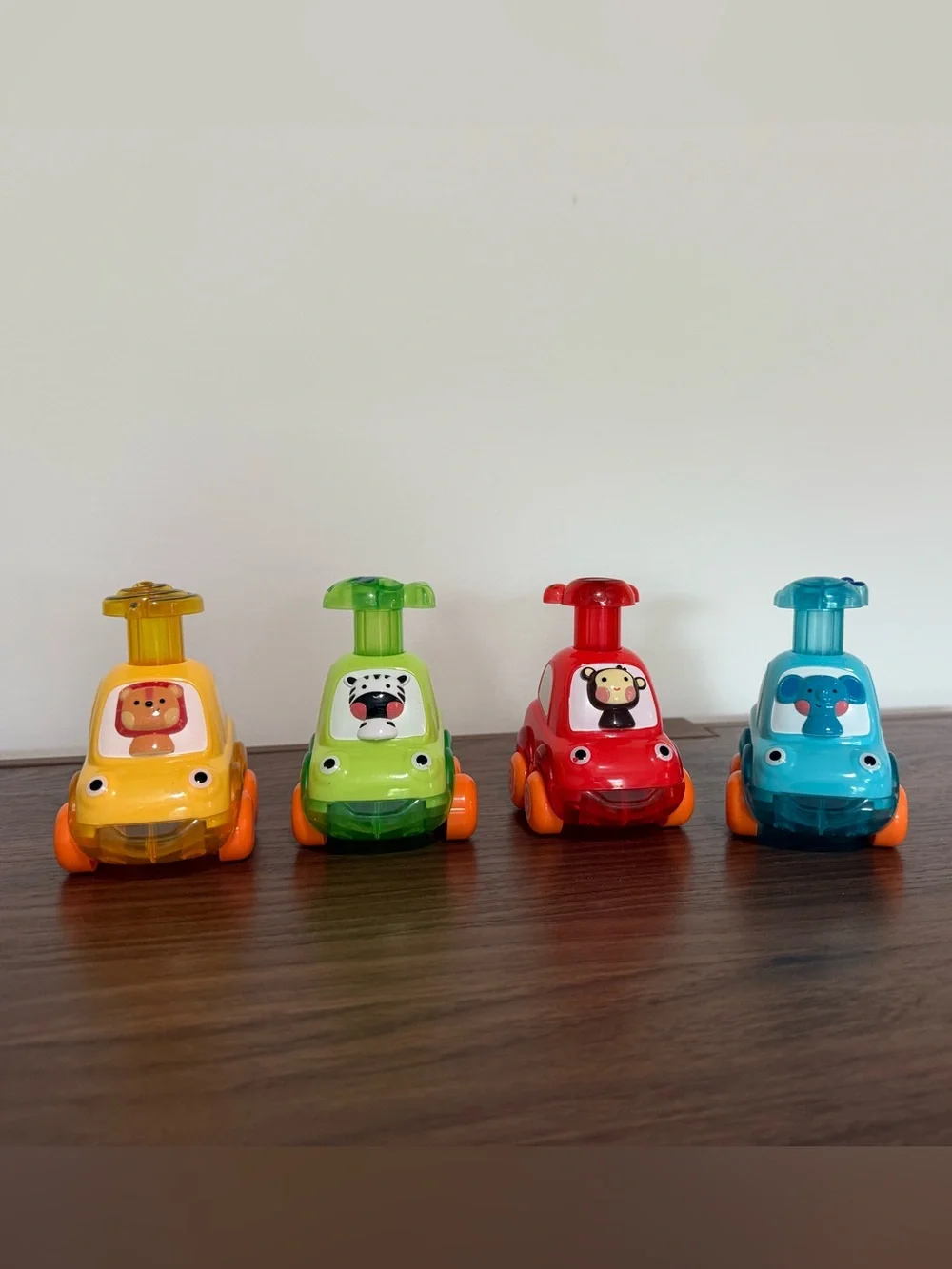 Set of 4 Push-Action Animal Racer Cars - Red, Yellow, Green, Blue
